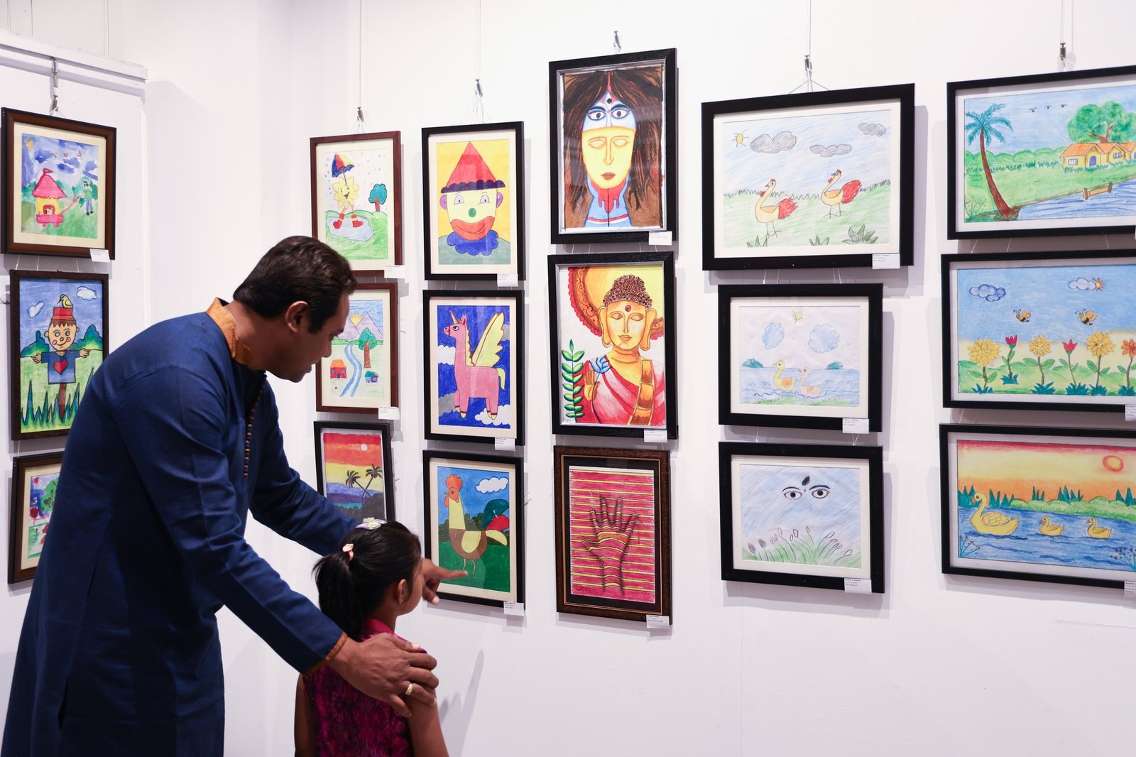Children Art Exhibition: Chapter 6 6 Children seeing their Art in Wall