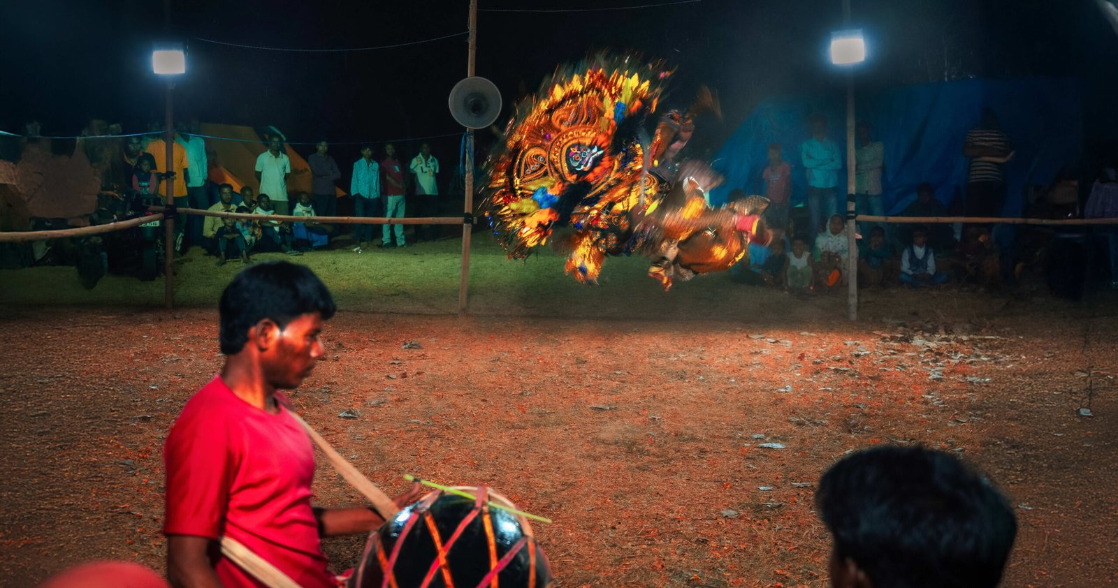 Chhau dancer performing traditional masked dance