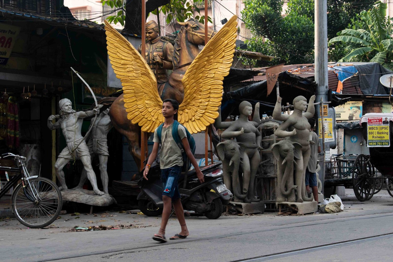 10. A Boy Walking in Kumartuli Street Photo © Anwesha Gupta