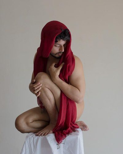 Seated-man-with-a-red-Veil